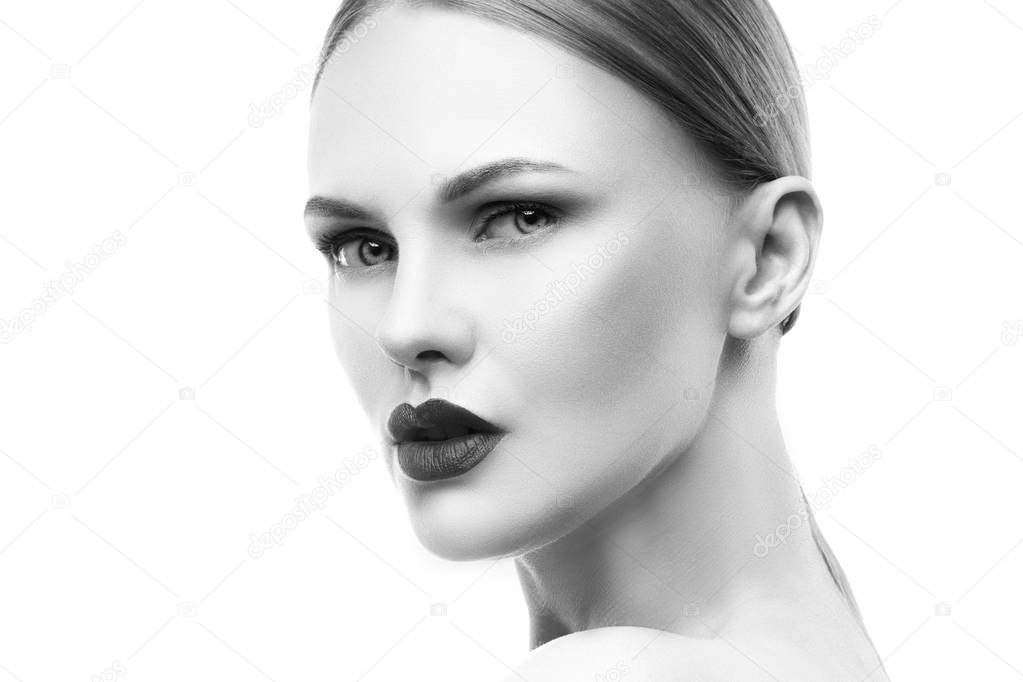 portrait of young woman with natural makeup and dark lips on white background