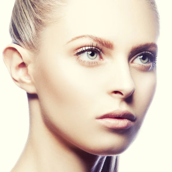 portrait of attractive blonde woman with natural makeup, close-up