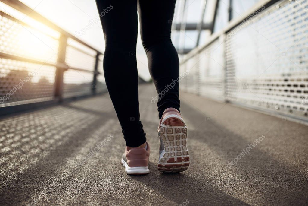 Athlete running sport feet on trail, healthy lifestyle fitness. 