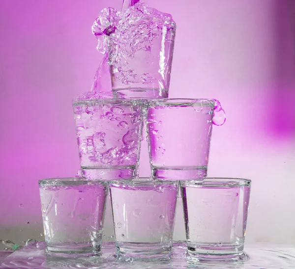 Six Glasses Stacked Tower Multi Colored Background — Stock Photo, Image