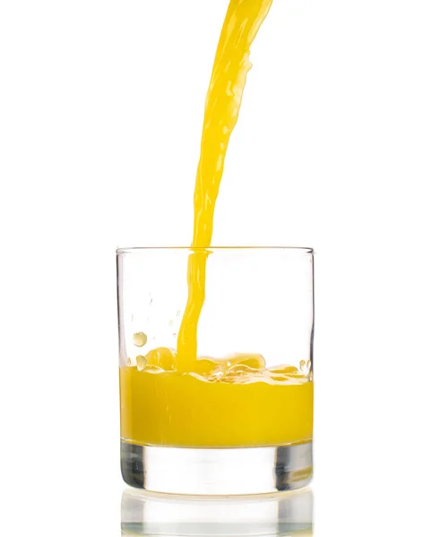 Pouring Orange Juice Transparent Glass White Background — Stock Photo, Image