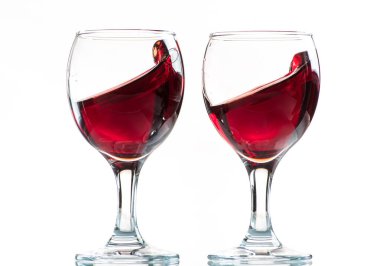 bir cam kırmızı şarap sıçrama ve akış, hız dondurmak