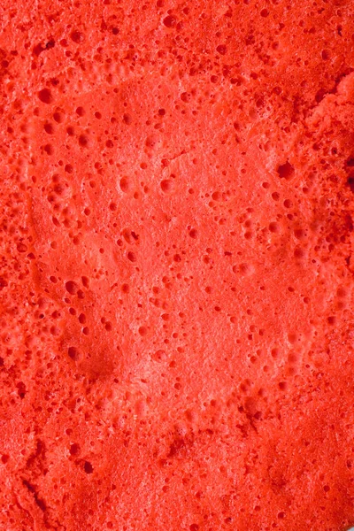 red dough. texture of a red pie. red pie close-up. top view