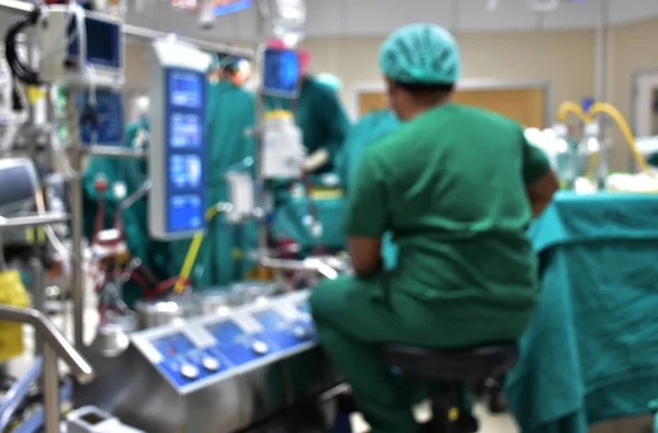 In cardio vascular and thoracic operating room, they are running cardiac surgery by heart lung machine. Viwe from perfusionist. Blurred is appled with this picture.