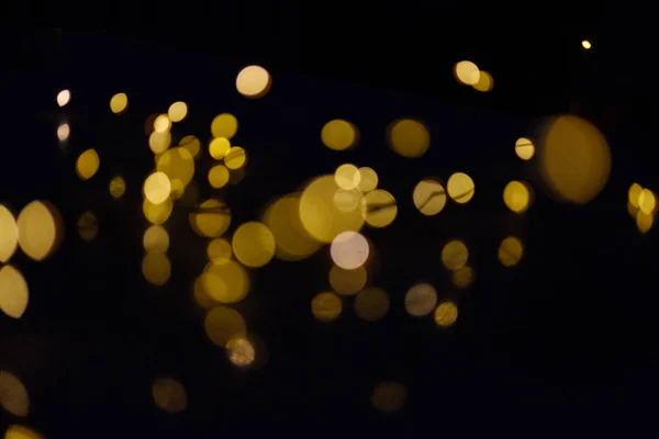 Gold-Bokeh-Kreise auf dunklem Hintergrund, Abstraktion, Hintergrund — Stockfoto