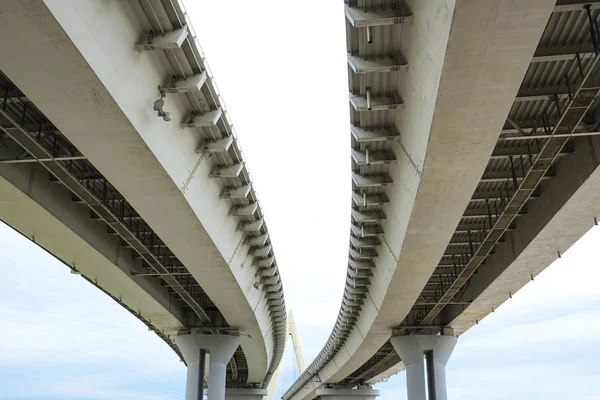 The construction of the road bridge. Bottom view. Architecture concept — Stock Photo, Image