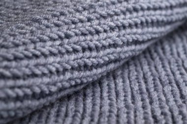 Gri yünlü örme kazak. Doku, makro görünümü kapat
