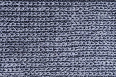 Gri yünlü örme kazak. Doku, makro görünümü kapat