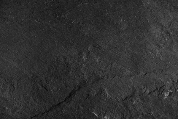 Dunkelgrau-schwarzer Schieferhintergrund oder Textur aus Naturstein. — Stockfoto