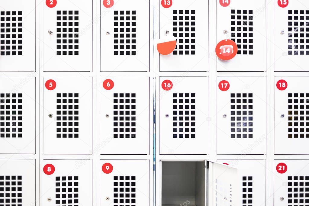 One locker is open in the supermarket. Storage lockers with rooms