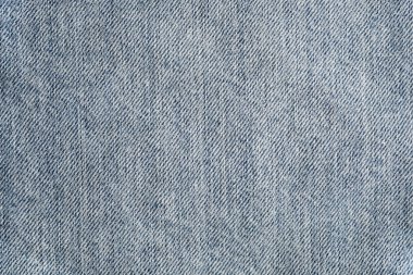 Denim kot dokusu. Tasarım için Denim arka plan dokusu. Arka plan olarak kullanılabilecek mavi denim. Tuval Denim dokusu. 
