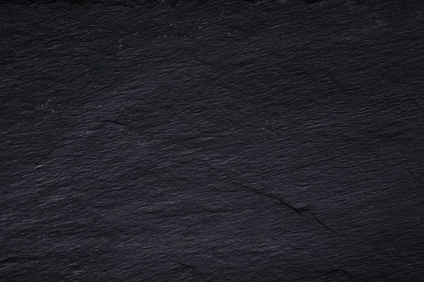 Tmavě šedá černá břidlice nebo textura přírodního kamene. — Stock fotografie