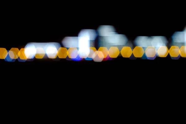 Color bokeh circles on a dark background, abstraction, background. Defocused blur across — Stock Photo, Image