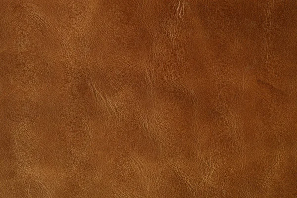 Hellbraune oder orangefarbene Textur aus echtem Leder, echtes Leder — Stockfoto