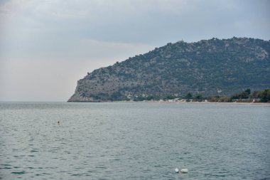 Mattinata deniz manzarası panorama sabah bulutlu gökyüzü ile tarafından 