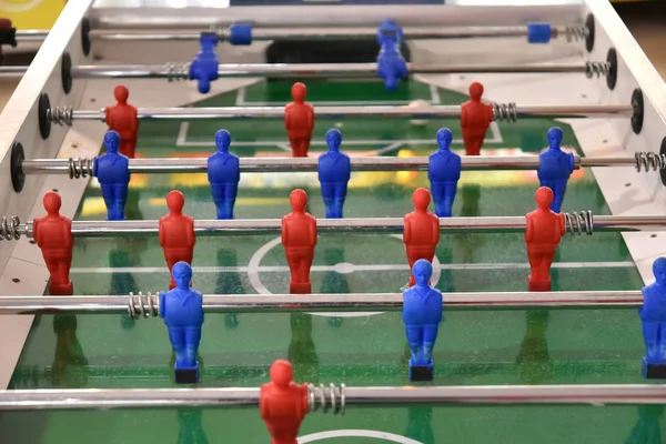 Foosball game players, table game