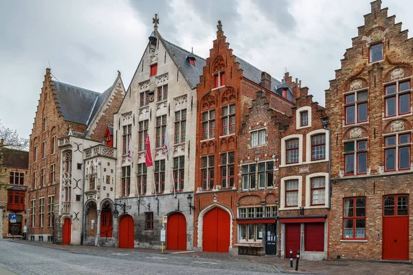 Street with historic houses in Bruges city center, Belgium