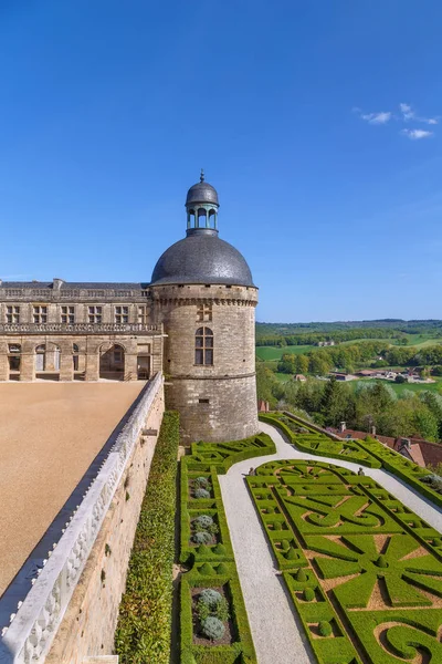 Chateau de Hautefort is French castle in Dordogne, France. Tower and garden