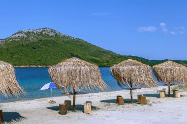 Sazdan şemsiyeler, Chalkidiki, Yunanistan