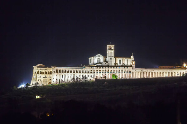 Evening. The Papal Basilica of St. Francis of Assisi is the mother church of the Roman Catholic Franciscan Order in Assisi, Italy