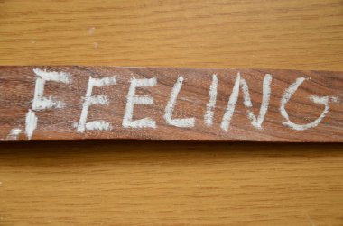 wooden sign with word love