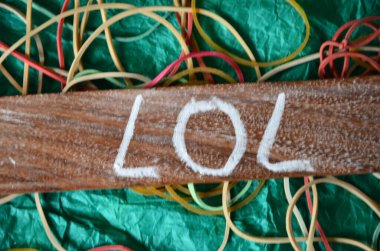 a wooden board with a word 