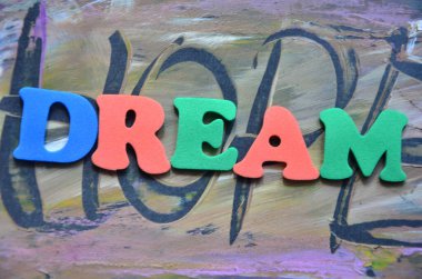 the word dream,on a   abstract background