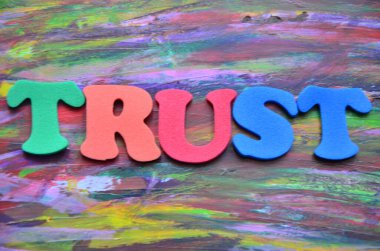 trust text sign with abstract colorful background