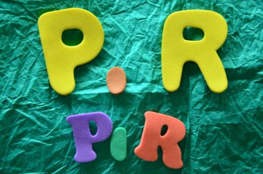 colorful wooden letters with text 