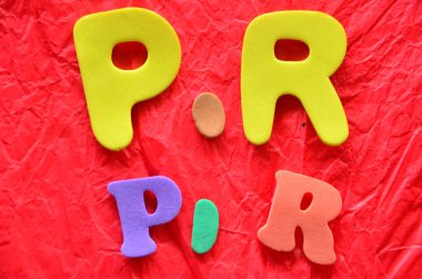 letters from the alphabet on a pink background