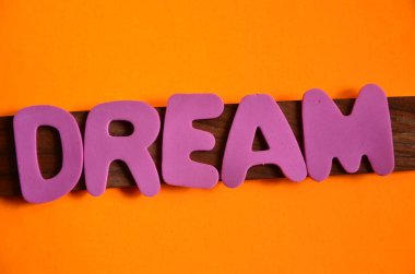 dream word with abstract background from white letters