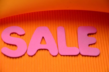 renkli bir arka plan üzerinde kelime satış