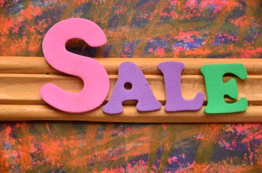 renkli arka plan üzerinde kelime satış