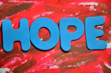 soyut arkaplan üzerindeki umut metni