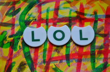 word laugh on abstract background