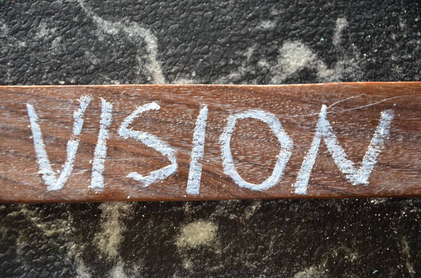 Деревянный знак, на котором написано видение
