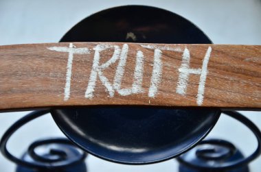 the word truth written on wooden letters