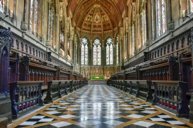 UK, Cambridge - August 2018: St John's College Chapel, view along the Nave clipart