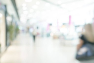 Mağaza bokeh arka plan bulanıklık. Siluetleri bulanık hareket yürüyüş iş adamları. Office koridorda yürürken iş adamları.