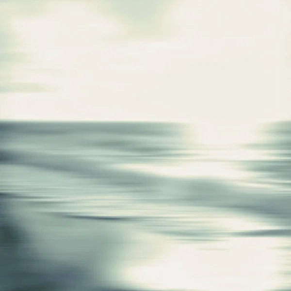 Un paisaje marino abstracto con movimiento de panorámica borrosa. Imagen di —  Fotos de Stock