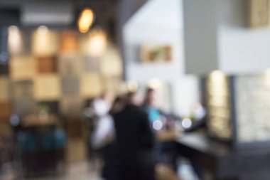 Bokeh görüntüsüyle bir restoran bulanıklık arka plan.