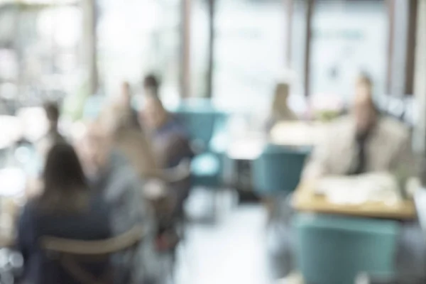 Bokeh imajı olan bir kafenin arka planı bulanık . — Stok fotoğraf