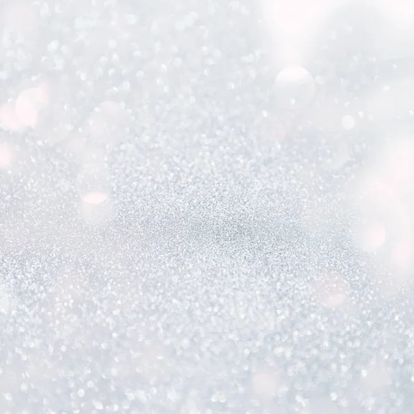 Zilver wit glinsterende lichten van Kerstmis. Wazig abstracte backg — Stockfoto