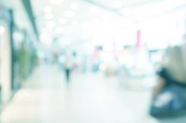 Mağaza bokeh arka plan bulanıklık. İş adamları siluetleri