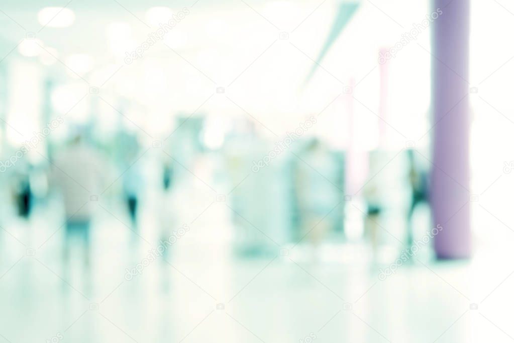 Abstract blurred image of shopping mall and people for backgroun
