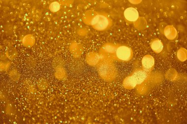 Soyut odağını yitirmiş dairesel altın lüks parıltılı Bokeh lig
