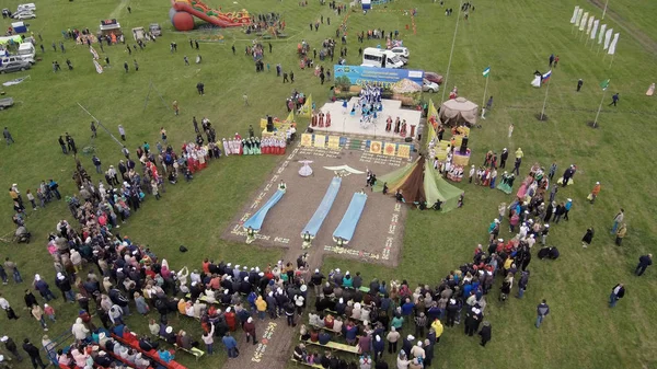 Folk festivals in Bashkiria - Sabantuy - the holiday of the plow. Aerial view.