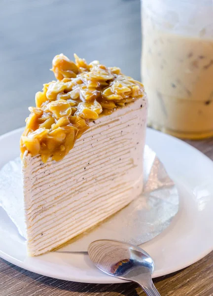 Cut Piece Salted Caramel Crepe Cake Nuts — Stock Photo, Image