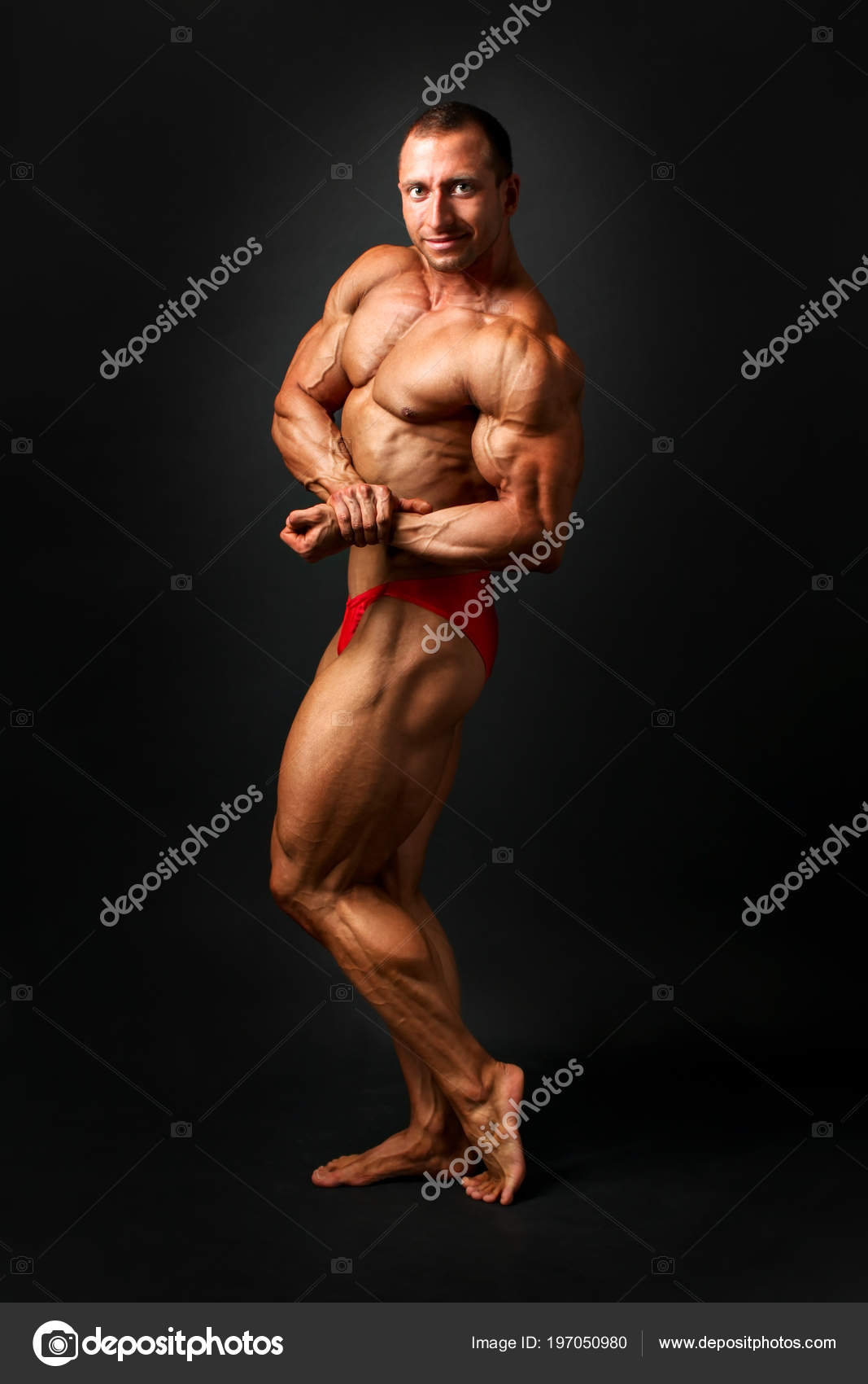 Bodybuilder Performing Side Chest Pose Stock Image - Image of people,  equipment: 227372591