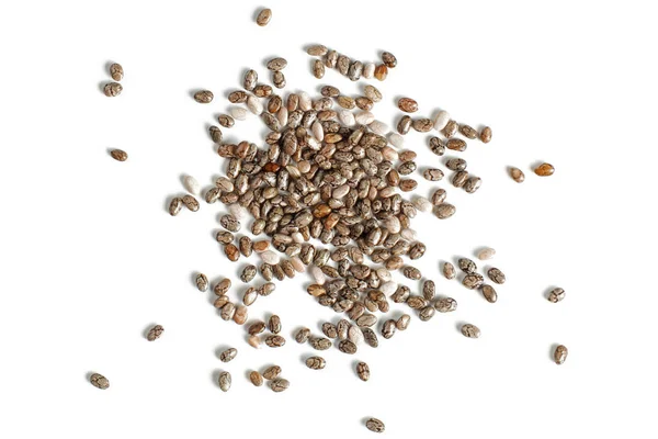 Yukarıdan ateş beyaz arka plan üzerinde izole ayrıntı makro closeup fotoğraf dökülen chia tohumu (Salvia hispanica).